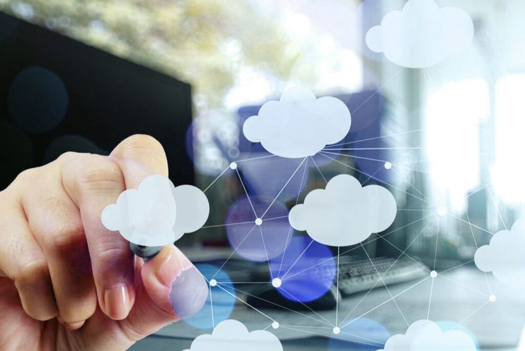 Hand pointing to digital cloud with stylus image