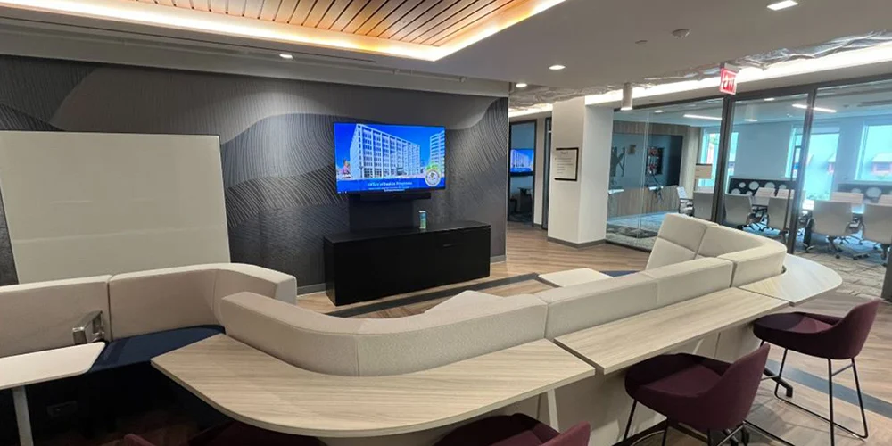 Department of Justice office with shared workspace area