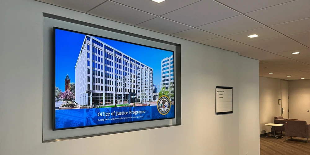 TV monitor in large government conference room