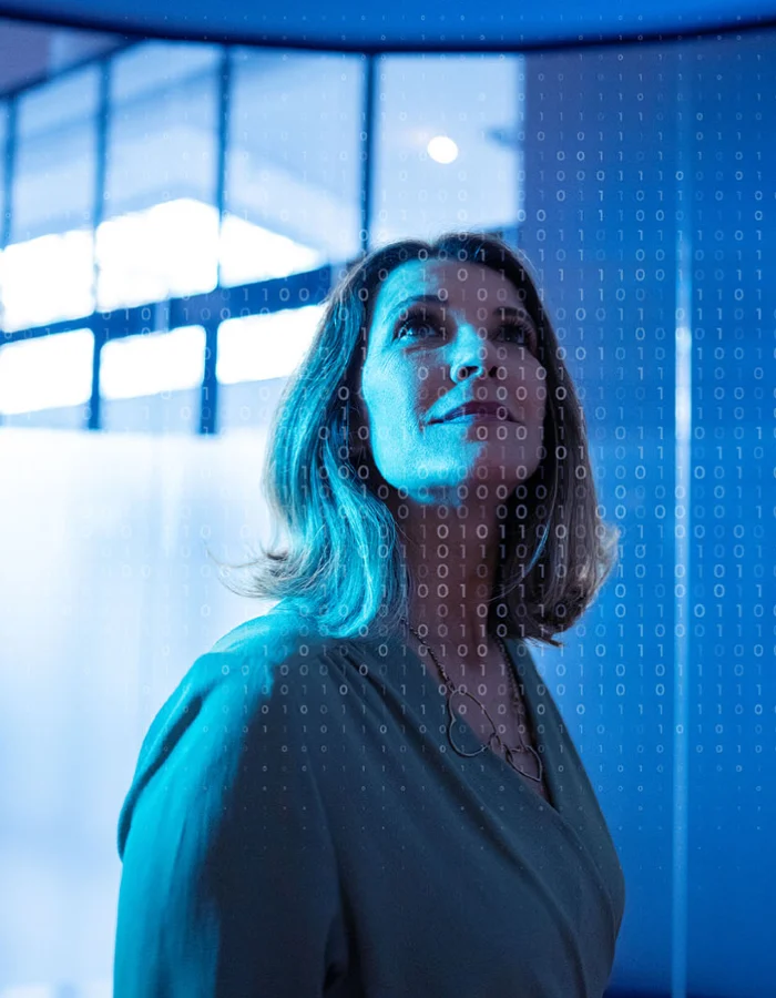 A young woman on a corporate technology team